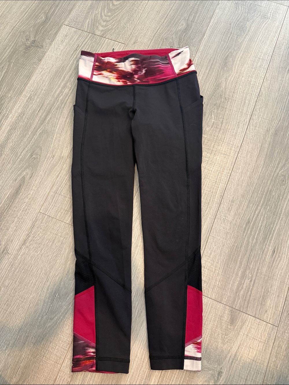 Lululemon leggings size 2 black with pink and white waistband and leg detail